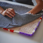 Tela secundaria para tufting