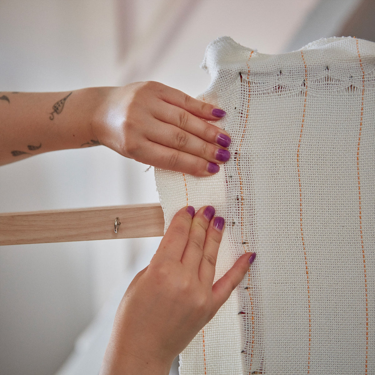 White primary tufting cloth with yellow lines